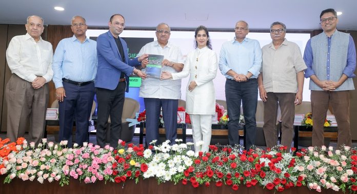 Dignitaries and students at NMIMS Indore during the multi-event ceremony featuring book launches, SPIC MACAY Heritage Club inauguration, and student felicitations.